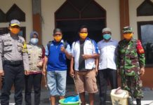 Kegiatan BKTM desa pangiang melaksanakan penyemprotan desinfektan