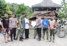 Bersama TNI dan Komunitas Motor Trail, Polres Pasangkayu Salurkan Bansos