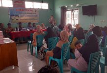 Bhabinkamtibmas Polsek Bambalamotu Hadiri Rembuk Stunting Desa Kenyabur Baru