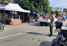 Bhabinkamtibmas Polsek Bambalamotu Pengaturan di Pasar Tradisional Cegah Kemacetan,