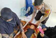 Tumbuhkan Generasi Yang Sehat, Bhabinkamtibmas Polsek Bambalamotu Pantau Posyandu Balita