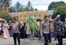 Wujud Pelayanan Prima, Kapolsek Bambalamotu Hadir bersama Bhabinkamtibmas Pengamanan Pesta Pernikahan Warganya