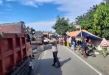 Menjalin Kedekatan Dengan Warga Bhabinkamtibmas Polsek Bambalamotu Sambangi Pedagang Pasar Tradisional