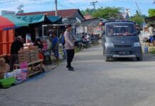 Bhabinkamtibmas Polsek Baras Amankan Pasar Tradisional Parabu.