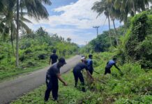 Bhabinkamtibmas Polsek Bambalamotu Bersama Warga Laksanakan Kegiatan Kerja Bakti