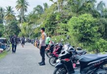 Bhabinkamtibmas Polsek Bambalamotu Patroli Sambang Pasar Tradisional Sampaikan Pesan Kamtibmas