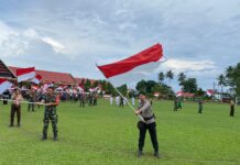 Polres Pasangkayu Mengikuti Kirab Bendera Merah Putih Yang Digelar kodim 1427/Pasangkayu di Anjungan Vovasanggayu