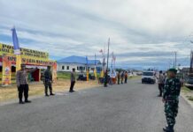 Personel Pos Pam Anjungan Polres Pasangkayu Rutin Laksanakan Pengaturan Lalu Lintas Pagi dan Sore