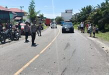 Polsek Bambalamotu Laksanakan Pengamanan Arus Lalin Di Lokasi Laka Lantas Untuk Cegah Kemacetan Dan Laka Lanjutan