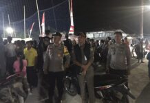 Bhabinkamtibmas Amankan Pertandingan Bola Voli Antar Kecamatan dalam Rangka HKG PKK ke-53 di Pasangkayu