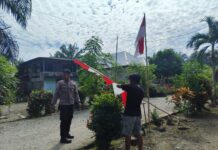 Semangat Merah Putih di Desa Bulu Bonggu: Bhabinkamtibmas Ajak Warga Kibarkan Bendera Demi Keutuhan NKRI”