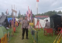 Bhabinkamtibmas Polsek Bambalamotu Hadirkan Rasa Aman di Lomba Pramuka Tangguh Lopita 2025