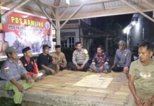 Bhabinkamtibmas Polsek Bambalamotu Intensifkan Patroli Dialogis dan Pemantauan Pos Kamling di Desa Kalola