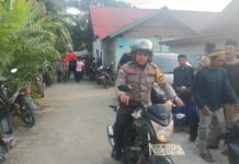 Bhabinkamtibmas Polsek Bambalamotu Dampingi dan Kawal Prosesi Pemakaman Warga Desa Randomayang