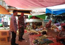 Sambang Dan Patroli Di Pasar Tradisional Desa Motu, Polsek Baras Sampaikan Pesan Kamtibmas