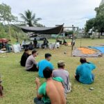 Bhabinkamtibmas Polsek Bambalamotu Panen Jagung Bersama Warga di Desa Randomayang