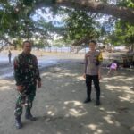 Bhabinkamtibmas Polsek Pasangkayu Hadir di Tengah Liburan: Jaga Keamanan Wisata Pantai Batu Oge