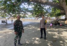 Bhabinkamtibmas Polsek Pasangkayu Hadir di Tengah Liburan: Jaga Keamanan Wisata Pantai Batu Oge