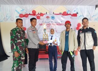 Bhabinkamtibmas Hadiri Hari Jadi Paskibra Sman 1 Bambalamotu Ke-12 Dan Jadi Juri Lomba PBB Tingkat SMP