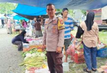 Polsek Sarudu Laksanakan Yanmas dan Pantau Aktivitas Warga di Pasar Desa Benggaulu