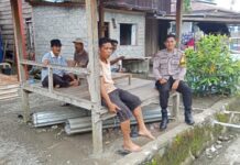 Bhabinkamtibmas Polsek Bambalamotu Ajak Warga Desa Kalola Waspada Cuaca Ekstrem dan Jaga Kamtibmas