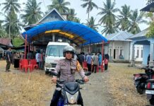 Bhabinkamtibmas Bambalamotu Polres Pasangkayu Laksanakan PAM dan Pengawalan Jenazah, Wujud Pelayanan Humanis kepada Masyarakat