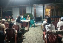 Bhabinkamtibmas Polsek Bambalamotu Hadiri Musyawarah Pembentukan Panitia Pesta Pernikahan, Sampaikan Pesan Kamtibmas