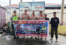 Sat Lantas Polres Pasangkayu Himbau Tertib Penggunaan Helm SNI di Jalan Trans Sulawesi