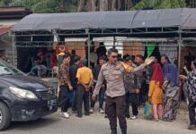 Bhabinkamtibmas Polsek Bambalamotu Amankan Pesta Pernikahan Warga di Desa Randomayang