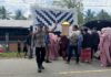 Bhabinkamtibmas Polsek Bambalamotu Amankan Pesta Pernikahan, Pastikan Situasi Kondusif dan Lalu Lintas Lancar