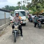 Bhabinkamtibmas Polsek Bambalamotu Tunjukkan Empati, Amankan dan Kawal Prosesi Pemakaman Warga di Randomayang