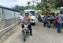 Bhabinkamtibmas Polsek Bambalamotu Tunjukkan Empati, Amankan dan Kawal Prosesi Pemakaman Warga di Randomayang