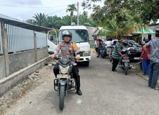 Bhabinkamtibmas Polsek Bambalamotu Tunjukkan Empati, Amankan dan Kawal Prosesi Pemakaman Warga di Randomayang