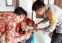 Bhabinkamtibmas Polsek Bambalamotu Pantau Posyandu Permata Hati, Dukung Integrasi Layanan Kesehatan Warga Desa Kalola