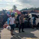 Jelang Idul Fitri, Bhabinkamtibmas Polsek Bambalamotu Amankan Aktivitas Pasar Tradisional Randomayang