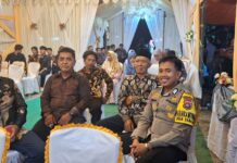 Polisi Hadir di Tengah Kebahagiaan Warga, Bhabinkamtibmas Amankan Pesta Pernikahan di Dapurang