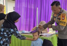 Bhabinkamtibmas Polsek Bambalamotu Dampingi Posyandu di Desa Letawa, Perkuat Upaya Cegah Stunting Sejak Dini