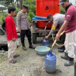 Polsek Bambalamotu Peduli, Air Bersih Mengalir untuk Warga Terdampak El Nino