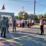 Bhabinkamtibmas Polsek Pasangkayu Kawal Prosesi Ngaben, Wujud Kehadiran Polri di Tengah Masyarakat