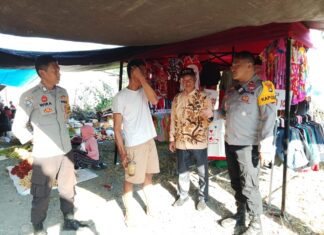 Kapolsek Bambalamotu Sambangi Pedagang, Ajak Ciptakan Pasar yang Tertib dan Nyaman