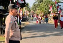 Bhabinkamtibmas Polsek Pasangkayu Amankan Jalan Santai HUT RI Ke-81 di Pedongga