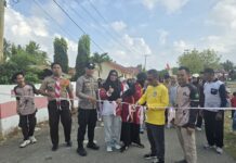 Bhabinkamtibmas Polsek Bambalamotu Amankan Jalan Sehat dan Senam dalam Rangka HUT Pramuka Ke-65 di Kecamatan Sarjo