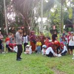 Semarak HUT RI ke-81, Bhabinkamtibmas Bambalamotu Pastikan Perlombaan Warga Aman dan Kondusif