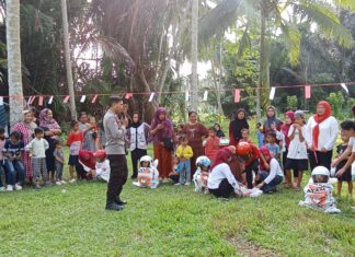 Semarak HUT RI ke-81, Bhabinkamtibmas Bambalamotu Pastikan Perlombaan Warga Aman dan Kondusif