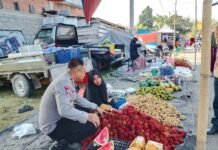 Kapolsek Bambalamotu Sambangi Pedagang, Imbau Jaga Ketertiban di Area Pasar