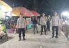 Polsek Sarudu Pastikan Pasar Malam Benggaulu Aman, Ratusan Warga Nikmati Hiburan dengan Nyaman