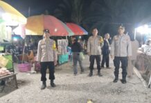 Polsek Sarudu Pastikan Pasar Malam Benggaulu Aman, Ratusan Warga Nikmati Hiburan dengan Nyaman