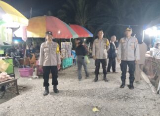 Polsek Sarudu Pastikan Pasar Malam Benggaulu Aman, Ratusan Warga Nikmati Hiburan dengan Nyaman