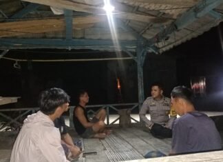 Bhabinkamtibmas Polsek Bambalamotu Perkuat Siskamling, Wujudkan Kamtibmas Aman dan Kondusif