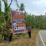 Cegah Kecelakaan di Jalur Rawan, Satlantas Polres Pasangkayu Pasang Spanduk Imbauan di Gunung Letawa